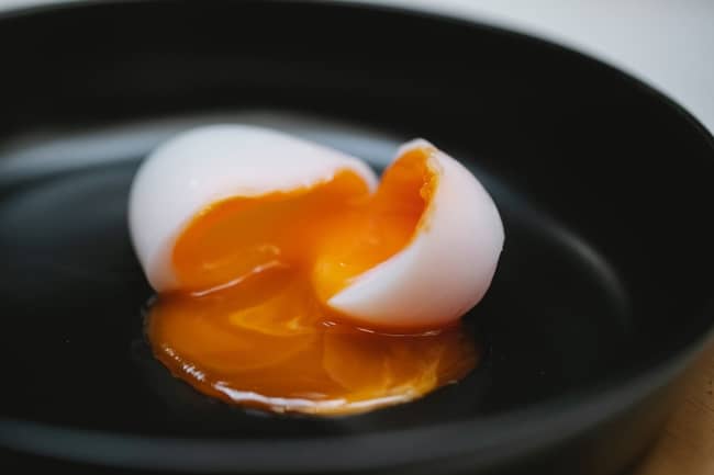 Breaking boiled egg