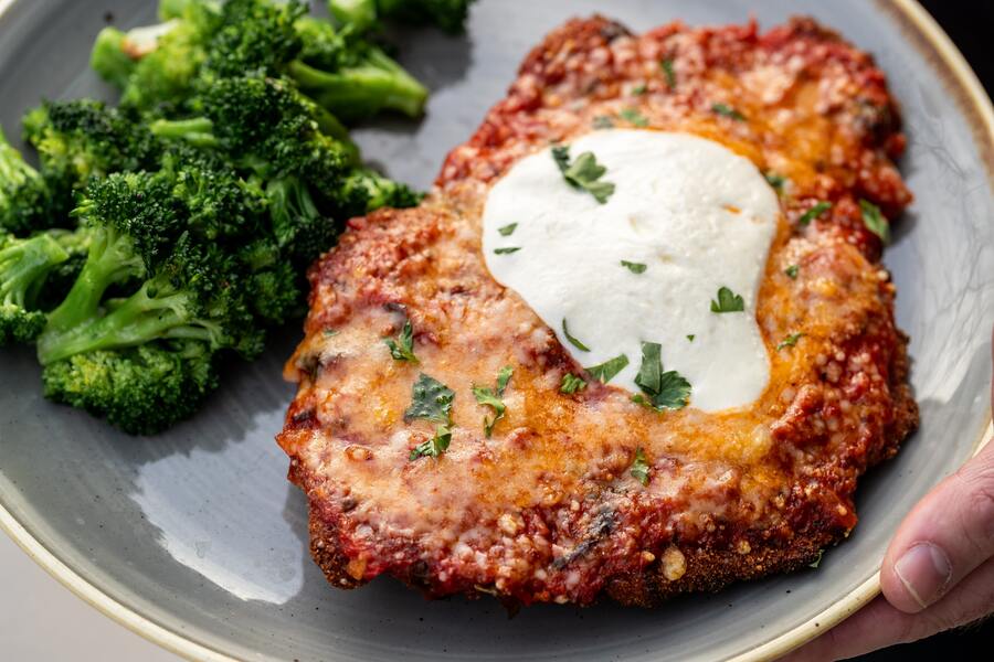 How long does it take to bake chicken parmesan at 375ºF